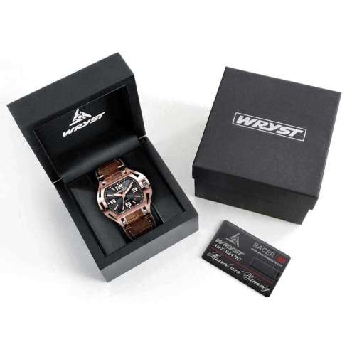 Black watch box with a rose gold men's watch inside